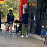 RTA sergeant questioned over double murder at Nakhon Phanom petrol station | Thaiger