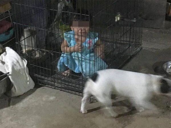 Teen mum caught on CCTV locking toddler in dog cage