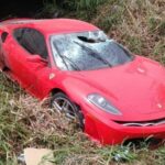 Red Ferrari crashes into Bangkok canal, driver unharmed | Thaiger