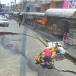 Motorcyclist and child fall into road sinkhole in Nonthaburi (video) | Thaiger