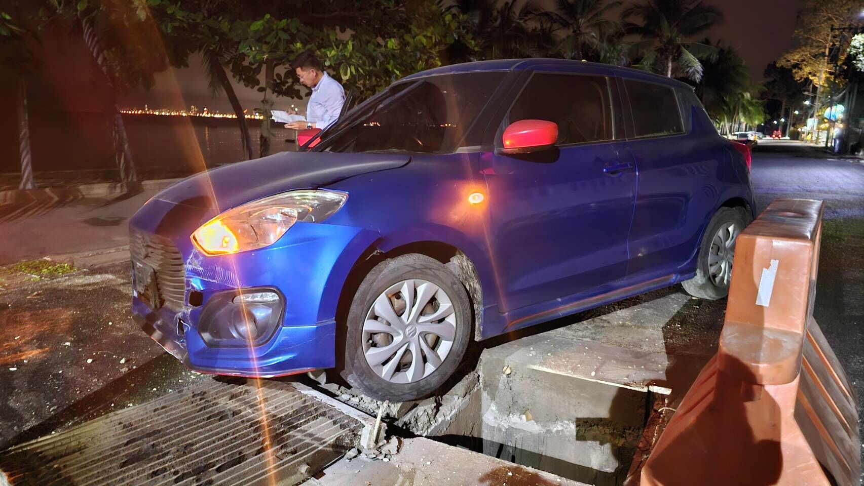 Tourist's car wheel trapped in poorly covered sewer hole in Sattahip | News by Thaiger