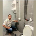 Man installs phone charger by shower, sparks safety debate | Thaiger