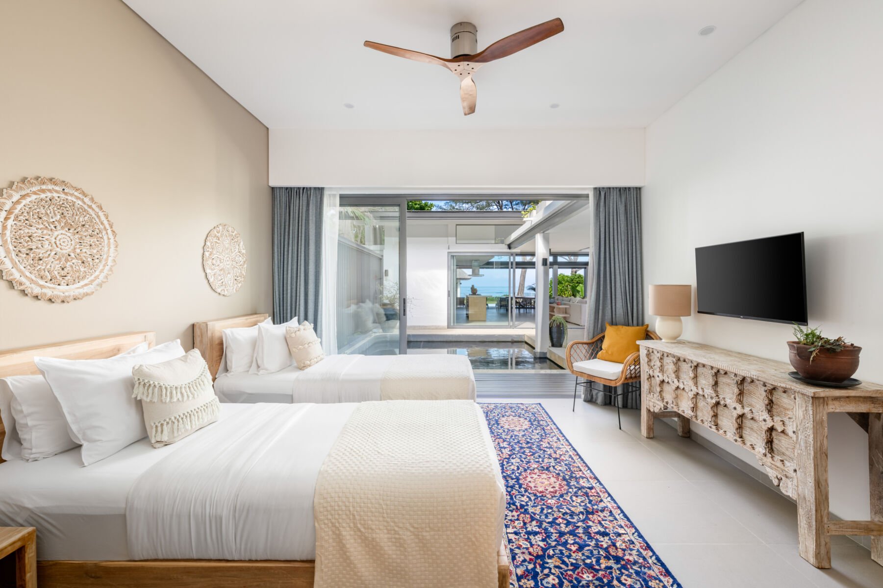 A spacious bedroom at Twin Natai Villa, a luxury villa in Phuket