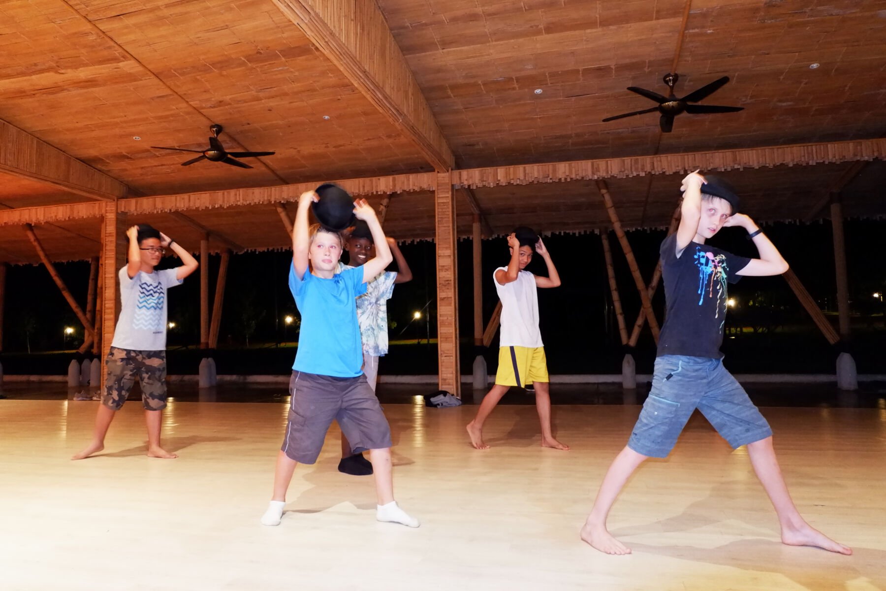 A group of boys in a dance class during a summer camp at iCamp Thailand