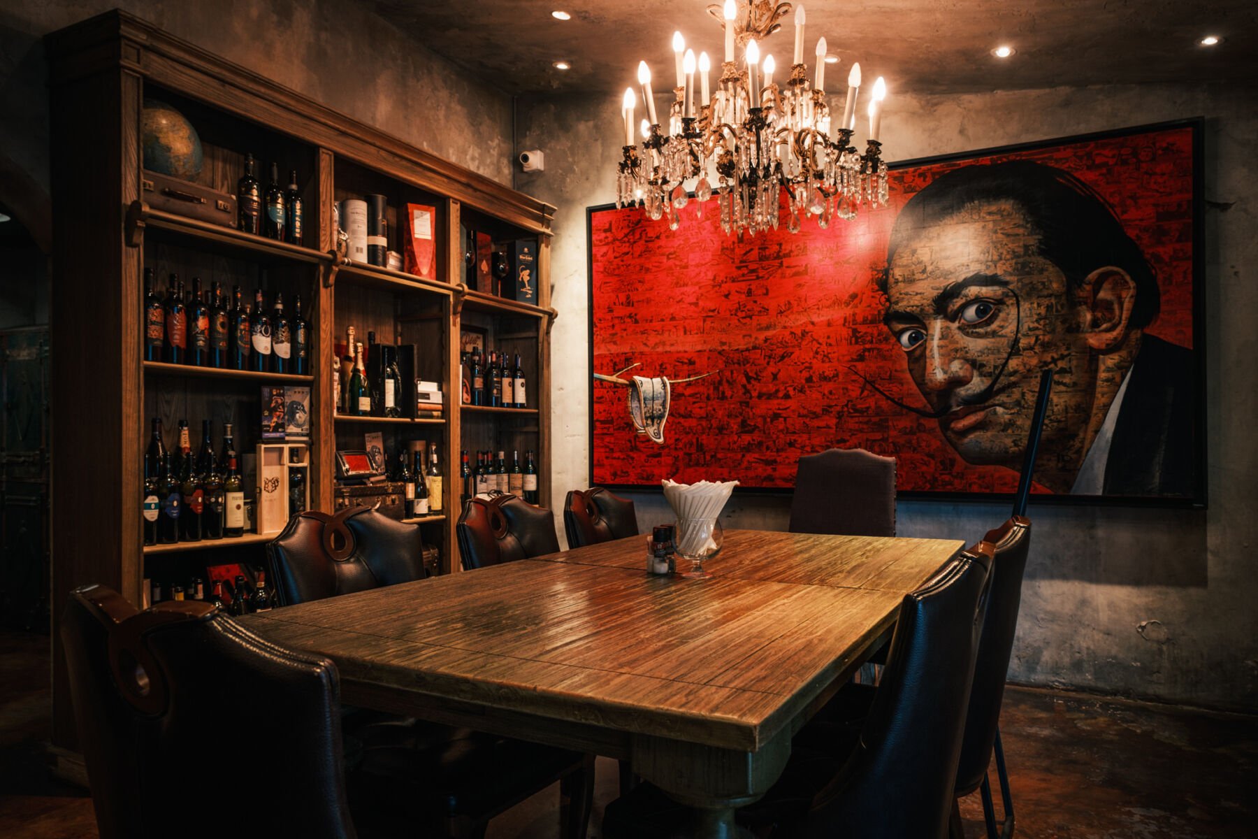 Salvador Dali's face painted on the wall of The Melting Clock, an Italian restaurant and wine lounge in Ekkamai, Bangkok