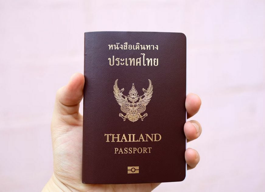 A person holding Thai passport
