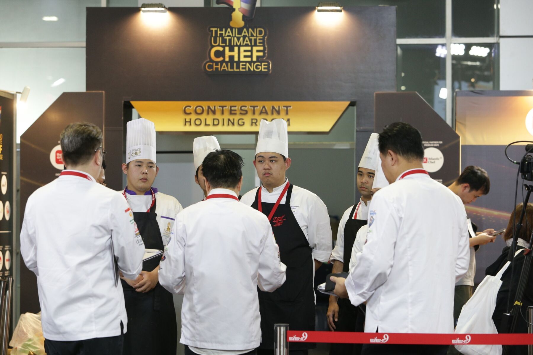 Male chefs standing in circle at The Thailand Ultimate Chef Challenge 2024 - THAIFEX - Anuga Asia 2024