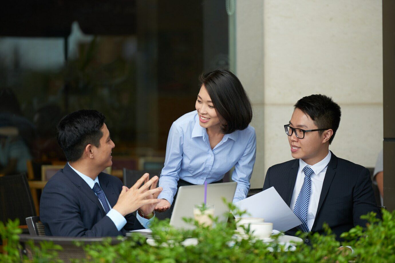 Business meeting between three people who are just learning Thai