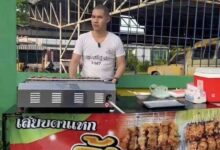 Police officer sells grilled pork to supplement income in Phetchabun