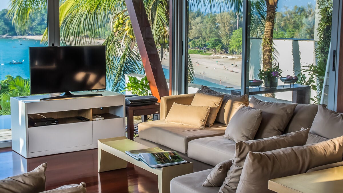 Living room at Laemsingh Villa 3, overlooking the ocean. One of the best luxury Thailand villas.