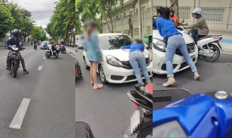 Woman clings to car bonnet in dramatic hit-and-run incident (video)