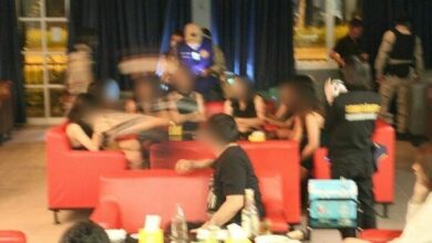 Police raid karaoke bar, find underage workers and drugs