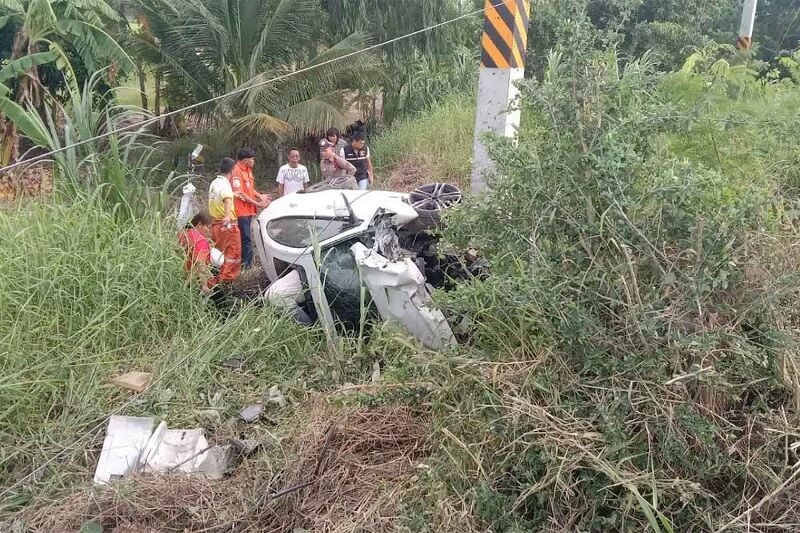 Woman uninjured after BMW hits power pole