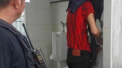 Gay voyeur caught filming truck driver in petrol station bathroom 