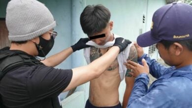 Homeless man makes himself comfy in Bangkok cop’s condo