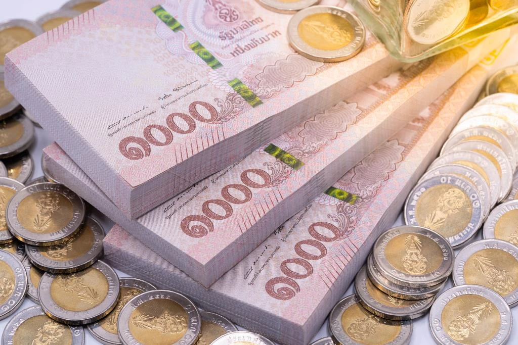 Thai baht may appreciate to 35.30 per dollar amid BoJ rate hike