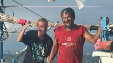 Russian woman reeled in by fishermen after 7 hours lost at sea