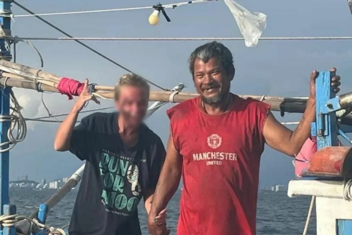 Russian woman reeled in by fishermen after 7 hours lost at sea