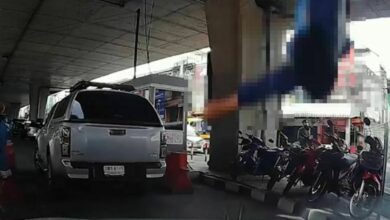 Thai woman falls from Nonthaburi bridge and lands on car below