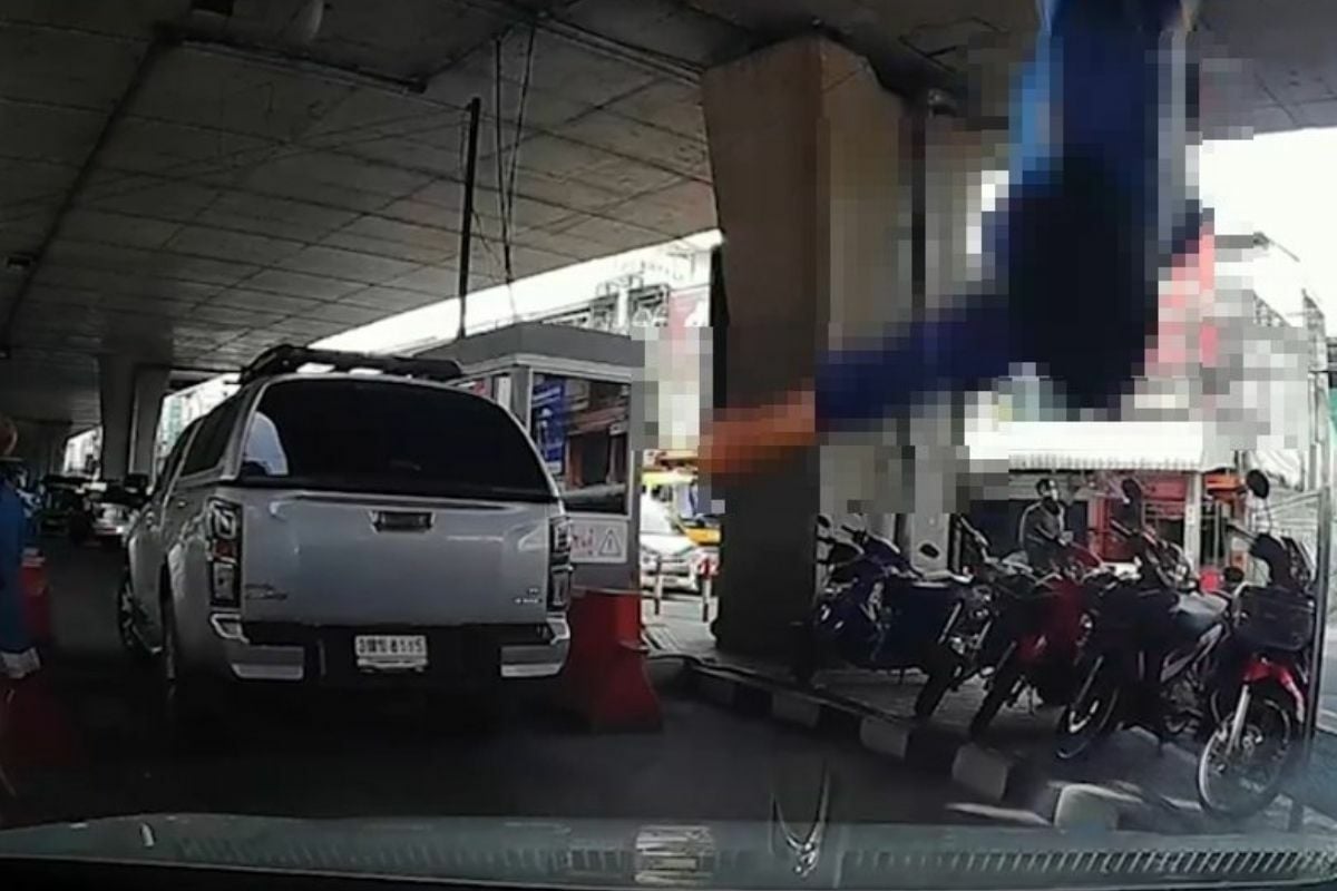 Thai woman falls from Nonthaburi bridge and lands on car below