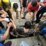 Thai woman pulled from manhole after shocking fall and trap | Thaiger