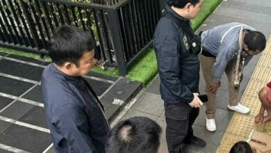 Cambodian woman caught begging in Bangkok with three children