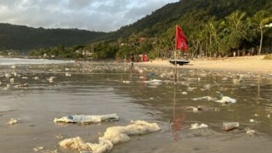 Monsoon leaves Patong Beach littered with trash and plastic waste