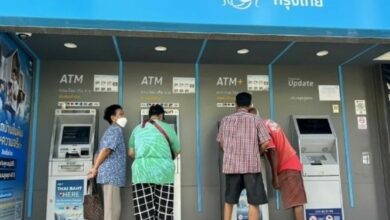 Gypsy cash dash: Phuket locals swarm ATMs for 10k baht handout