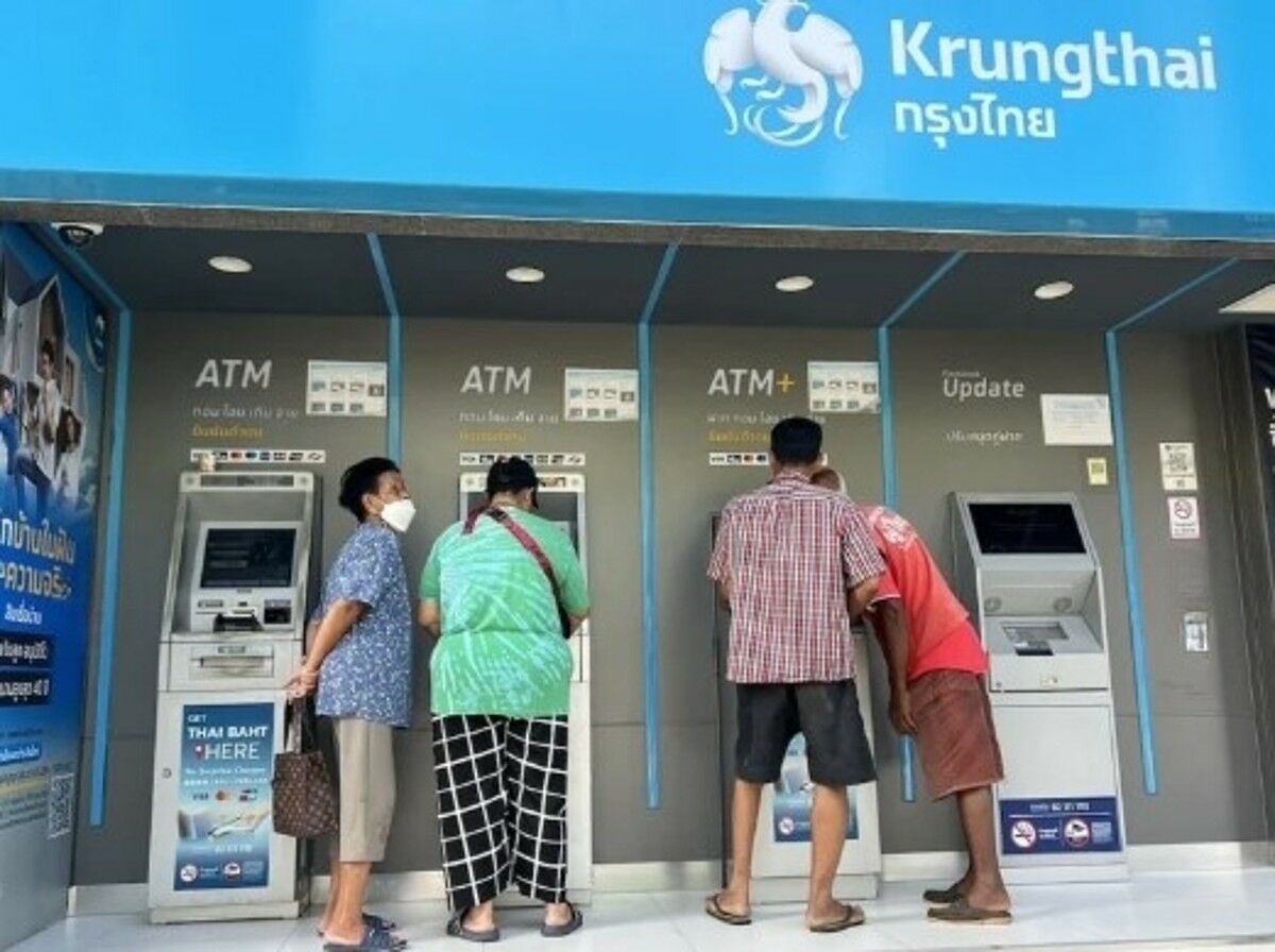 Gypsy cash dash: Phuket locals swarm ATMs for 10k baht handout