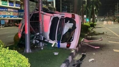 Car crashes into palm tree after motorcycle cuts lane in Pattaya