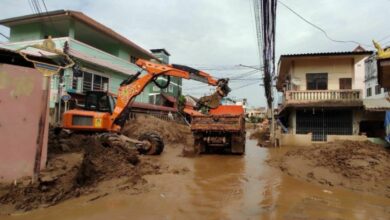 Thailand targets inflated mud removal fees in flood-hit areas