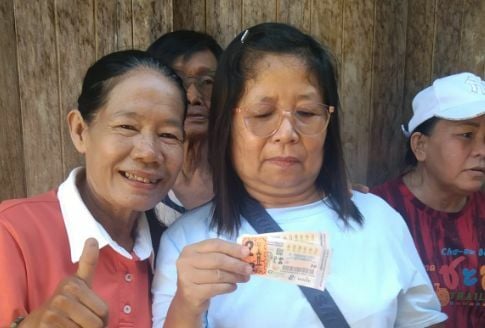 Village celebrates as woman wins 12 million baht lottery