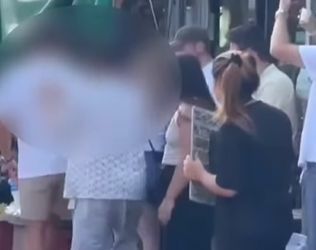 Coffee vendor banned for 30 days after altercation with tourist (video)