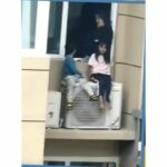 Chinese woman perches kids on 23rd-floor air con amid argument | Thaiger