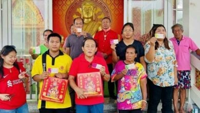 Residents rejoice at Chon Buri temple after lottery win