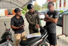 Phuket police crackdown on illegal Chinese tour guides ahead of High Season