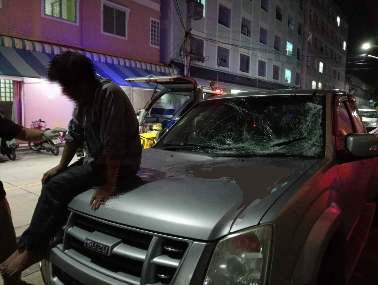 Jumping to conclusions: Thai man takes a dive to dodge the law