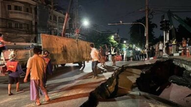 Large sinkhole forces closure of Bangkok bridge road