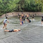 Natural waterslide wonderland: Tourists flock to Sattahip dam | Thaiger