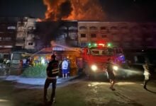 Fire ravages Ranong market building, efforts save nearby school