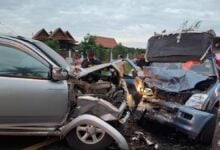 Elderly driver in Sisaket crash scatters goods on road