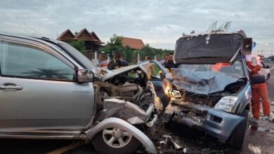 Elderly driver in Sisaket crash scatters goods on road