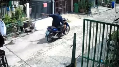 Food delivery rider fined 1,000 baht for firing gun at dogs