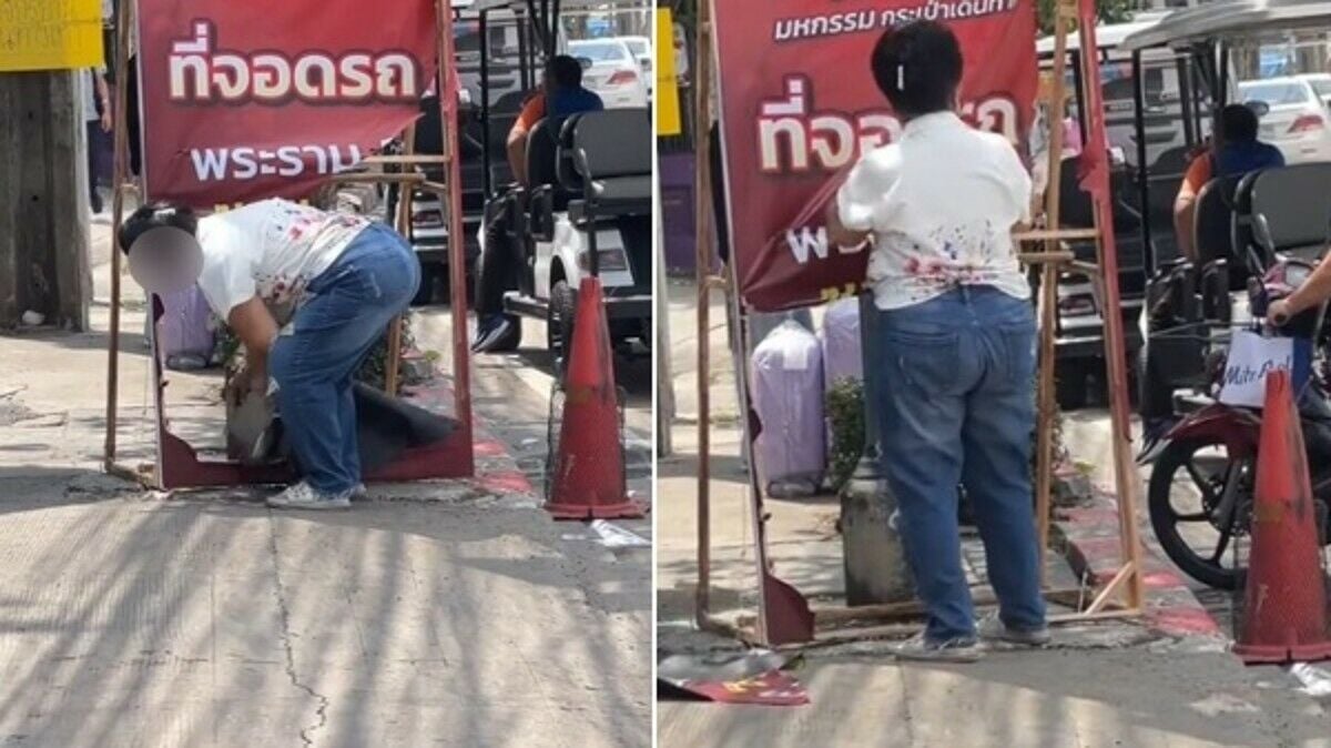 Bangkok market owner removes unauthorised luggage fair sign (video)