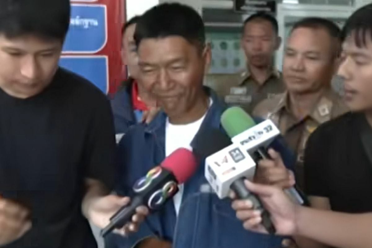 Thai man smile in interview after murder of his wife