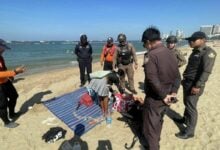 Homeless woman sent to rehab after using drugs on Pattaya Beach