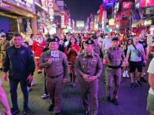 Festive cops hit Pattaya Walking Street with candies