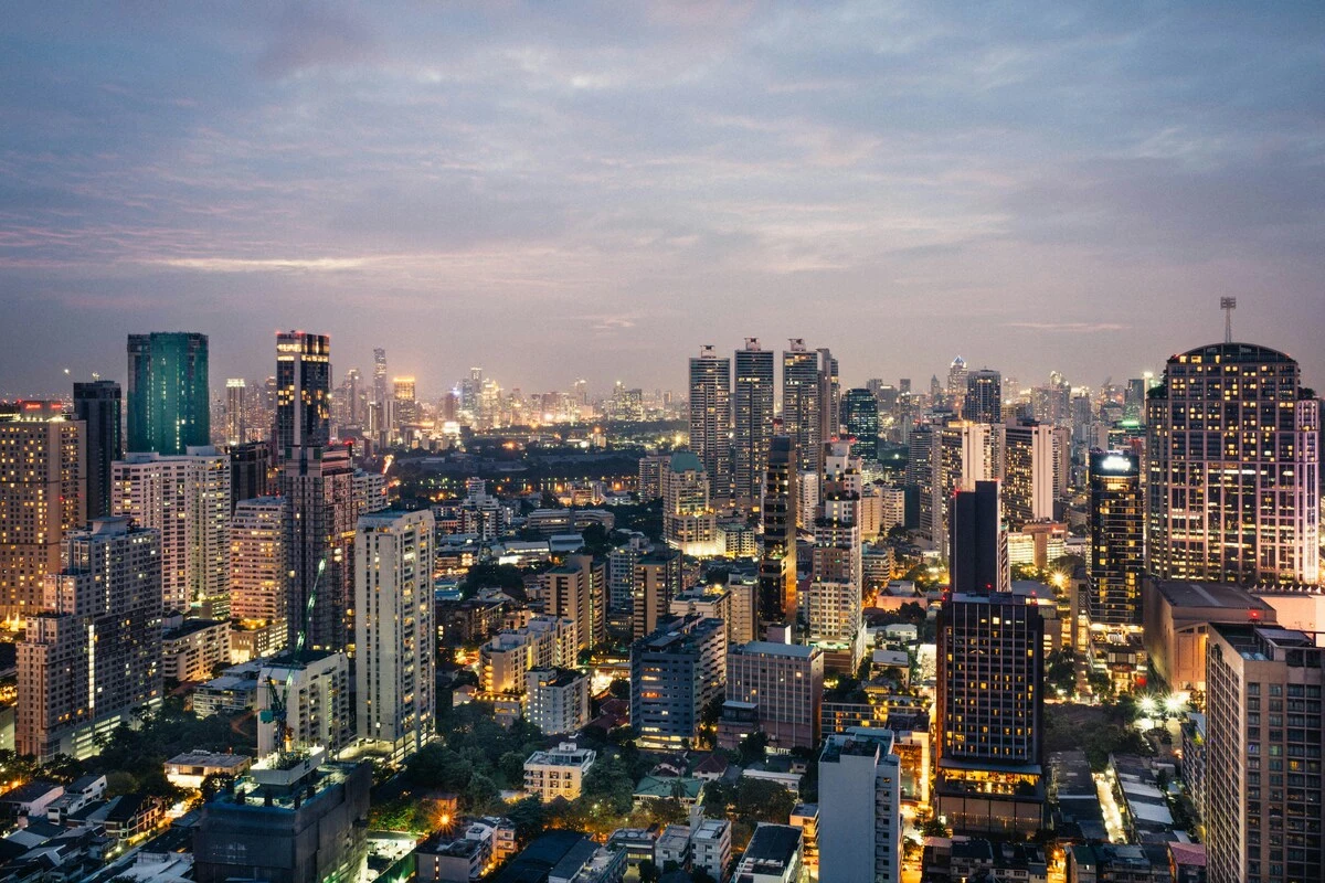 Bangkok, Thailand at night I Photo from Unsplash by Andreas Brรผcker