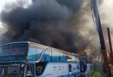 Fiery disaster: 9 buses damaged at coach park on Bangkok road