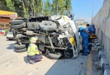 Thai truck driver walks away unscathed from Sukumvit smash